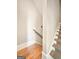 Wooden staircase with carpet runner at 500 Augusta Ln, Chattahoochee Hills, GA 30268