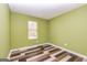 Bright bedroom with new flooring and neutral walls at 2994 Meadow Wood Ct, Lawrenceville, GA 30044