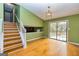 Bright dining room with hardwood floors and sliding glass doors at 2994 Meadow Wood Ct, Lawrenceville, GA 30044