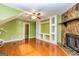 Living room featuring a stone fireplace and built-in shelving units at 2994 Meadow Wood Ct, Lawrenceville, GA 30044