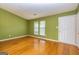 Living room with hardwood floors and a view of the backyard at 2994 Meadow Wood Ct, Lawrenceville, GA 30044