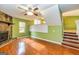 Spacious living room with a fireplace and hardwood floors at 2994 Meadow Wood Ct, Lawrenceville, GA 30044