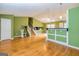 Open living space with hardwood floors and a staircase at 2994 Meadow Wood Ct, Lawrenceville, GA 30044