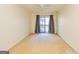 Bright bedroom with sliding glass doors leading to a balcony at 172 Twiggs Cor, Peachtree City, GA 30269