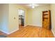 Simple dining area with hardwood floors and kitchen access at 172 Twiggs Cor, Peachtree City, GA 30269
