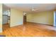 Open living area showcasing hardwood floors and access to the kitchen at 172 Twiggs Cor, Peachtree City, GA 30269
