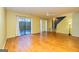 Living room featuring hardwood floors and a sliding glass door at 172 Twiggs Cor, Peachtree City, GA 30269