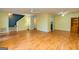 Spacious living room featuring hardwood floors and a view of the staircase at 172 Twiggs Cor, Peachtree City, GA 30269