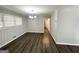 Bright dining room with hardwood floors and neutral wall colors at 4785 Kent Rd, Atlanta, GA 30337