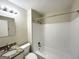 Clean bathroom with granite vanity and tile shower/tub at 2318 Emerald Falls Dr, Decatur, GA 30035