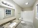 Clean bathroom, granite countertop, white subway tile shower, and bathtub at 2318 Emerald Falls Dr, Decatur, GA 30035