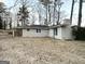 Ranch home with a spacious backyard and brick exterior at 4303 Mercer Rd, Decatur, GA 30035