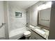 Updated bathroom with granite vanity and marble tile shower at 4303 Mercer Rd, Decatur, GA 30035