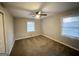 Simple bedroom with neutral carpeting and window blinds at 4303 Mercer Rd, Decatur, GA 30035