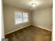 Cozy bedroom with neutral carpeting and ample natural light at 4303 Mercer Rd, Decatur, GA 30035