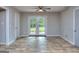 Dining area with tile floor and French doors at 3031 Golden Dr, East Point, GA 30344