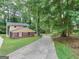 Charming ranch home with a yellow exterior and brick accents at 3031 Golden Dr, East Point, GA 30344