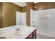 Clean bathroom with single sink and bathtub at 5539 Halsey Trce, Atlanta, GA 30349