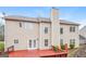 Two-story house with wooden deck and chimney at 5539 Halsey Trce, Atlanta, GA 30349