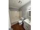 Clean bathroom with a tub, toilet and vanity at 3203 Pawnee Dr, Rex, GA 30273