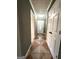 Bright entryway with tile floors and access to bedrooms at 3203 Pawnee Dr, Rex, GA 30273