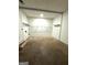 Laundry room with shelving and concrete floor at 3203 Pawnee Dr, Rex, GA 30273