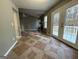 Living room with stone fireplace and access to a deck at 3203 Pawnee Dr, Rex, GA 30273