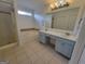 Bathroom with double vanity, soaking tub, and shower at 1345 Pinebreeze Way, Marietta, GA 30062