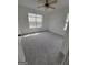 Bright bedroom with wainscoting and gray carpet at 1345 Pinebreeze Way, Marietta, GA 30062
