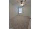Bedroom with gray carpeting and ceiling fan at 1345 Pinebreeze Way, Marietta, GA 30062