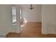 Bright dining room with hardwood floors and wainscoting at 1345 Pinebreeze Way, Marietta, GA 30062