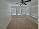 Sunroom with tile floor and multiple windows at 1345 Pinebreeze Way, Marietta, GA 30062