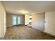 Finished basement with new carpet and access to the backyard at 1884 Derrill Dr, Decatur, GA 30032
