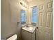 Small bathroom with granite countertop and updated vanity at 1884 Derrill Dr, Decatur, GA 30032