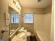 Updated bathroom with granite countertop and a bathtub at 1884 Derrill Dr, Decatur, GA 30032