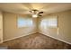 Well-lit bedroom with neutral walls and carpeted floors at 1884 Derrill Dr, Decatur, GA 30032