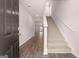 Inviting entryway with hardwood flooring and a staircase leading to the upper level at 12029 Conrad Circle, Hampton, GA 30228