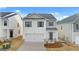 Beautiful two-story home with a two-car garage and traditional curb appeal at 12029 Conrad Circle, Hampton, GA 30228