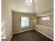 Bright bedroom with carpet flooring and a large window at 1996 Meadow Ln, Decatur, GA 30032
