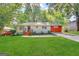 Charming ranch home with a well-manicured lawn and updated facade at 1996 Meadow Ln, Decatur, GA 30032