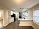 Modern kitchen with white cabinets, marble countertops, and stainless steel appliances at 1996 Meadow Ln, Decatur, GA 30032