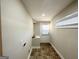 Laundry room with built-in storage and exterior access at 1996 Meadow Ln, Decatur, GA 30032