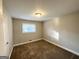 Cozy bedroom with neutral walls and carpet flooring at 2629 Preston Dr, Decatur, GA 30034