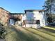 Two-story brick house with deck and backyard at 2629 Preston Dr, Decatur, GA 30034