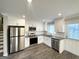 Modern kitchen with stainless steel appliances and white cabinetry at 2629 Preston Dr, Decatur, GA 30034