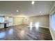 Open concept living and dining area with hardwood floors and recessed lighting at 2629 Preston Dr, Decatur, GA 30034