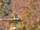Aerial view of house and surrounding wooded area at 304 Slaughter Rd, Hampton, GA 30228