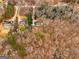 House nestled in a wooded area, aerial view at 304 Slaughter Rd, Hampton, GA 30228