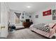 Bright bedroom with double bed, dresser, and window at 304 Slaughter Rd, Hampton, GA 30228