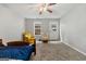 Spacious bedroom with two chairs and a bed at 304 Slaughter Rd, Hampton, GA 30228